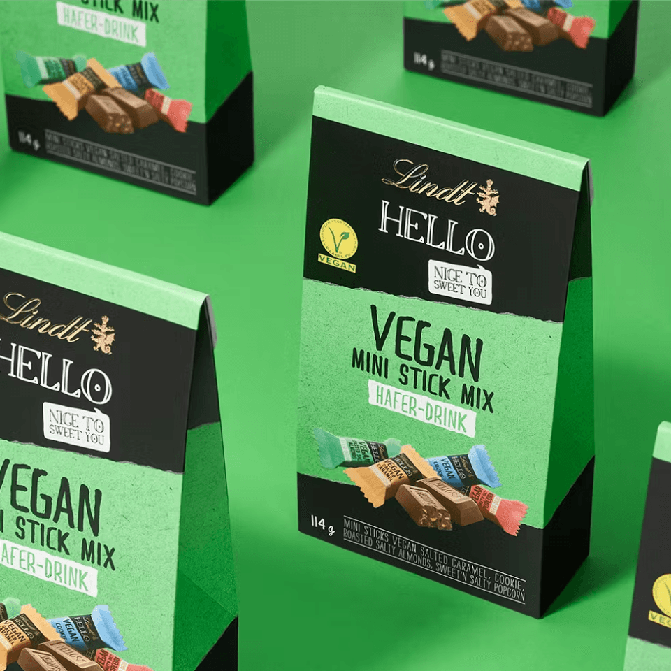 Lindt Hello Detailansicht – „Vegan"-Tafelverpackung in Türkis und Schwarz