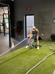 man in black hoodie standing