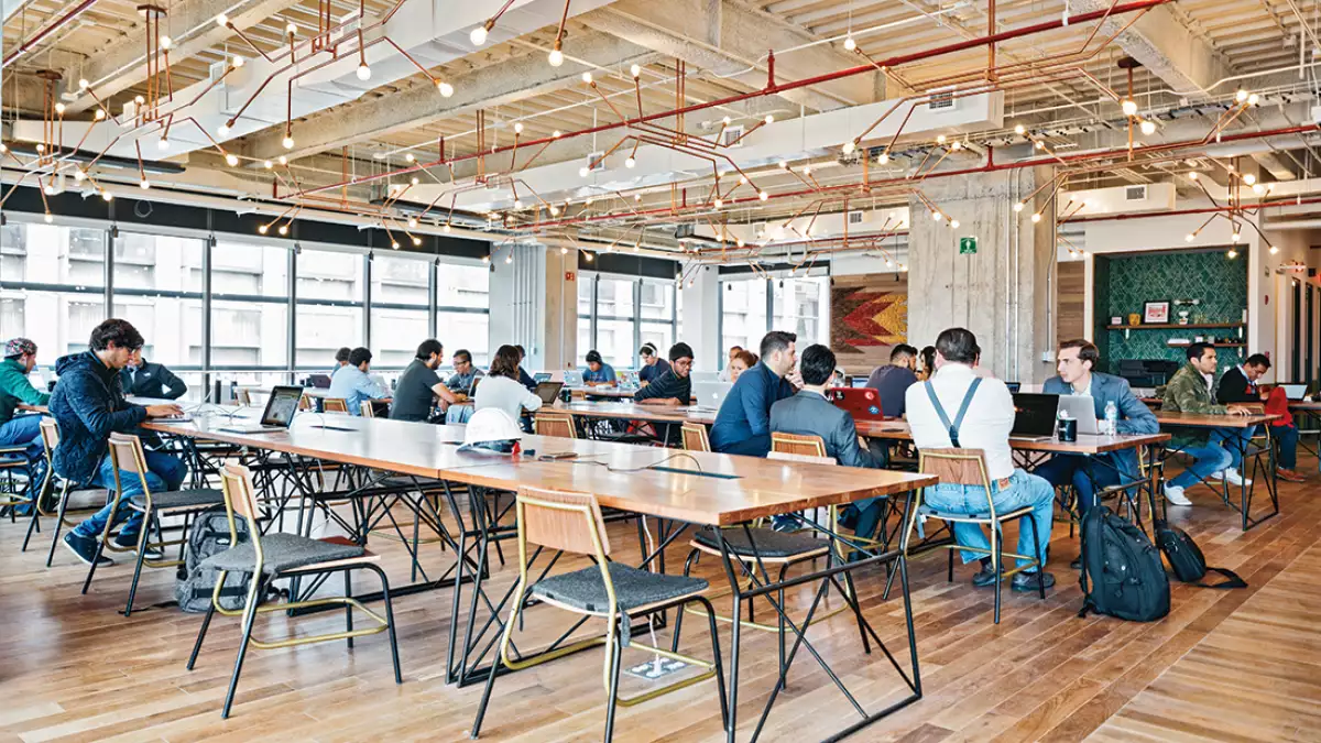 person making a contactless payment with a card