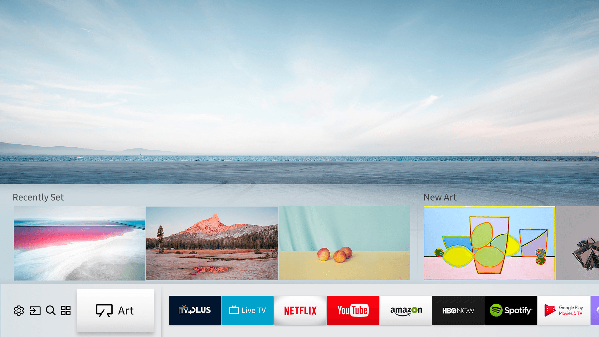 Image of people at a desk with their computers