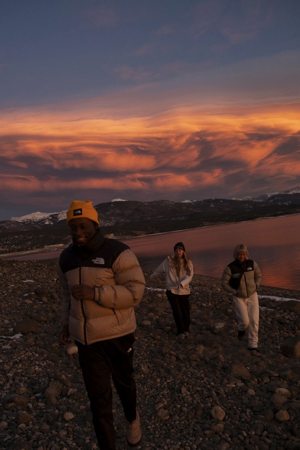 friends playing in the sunset 