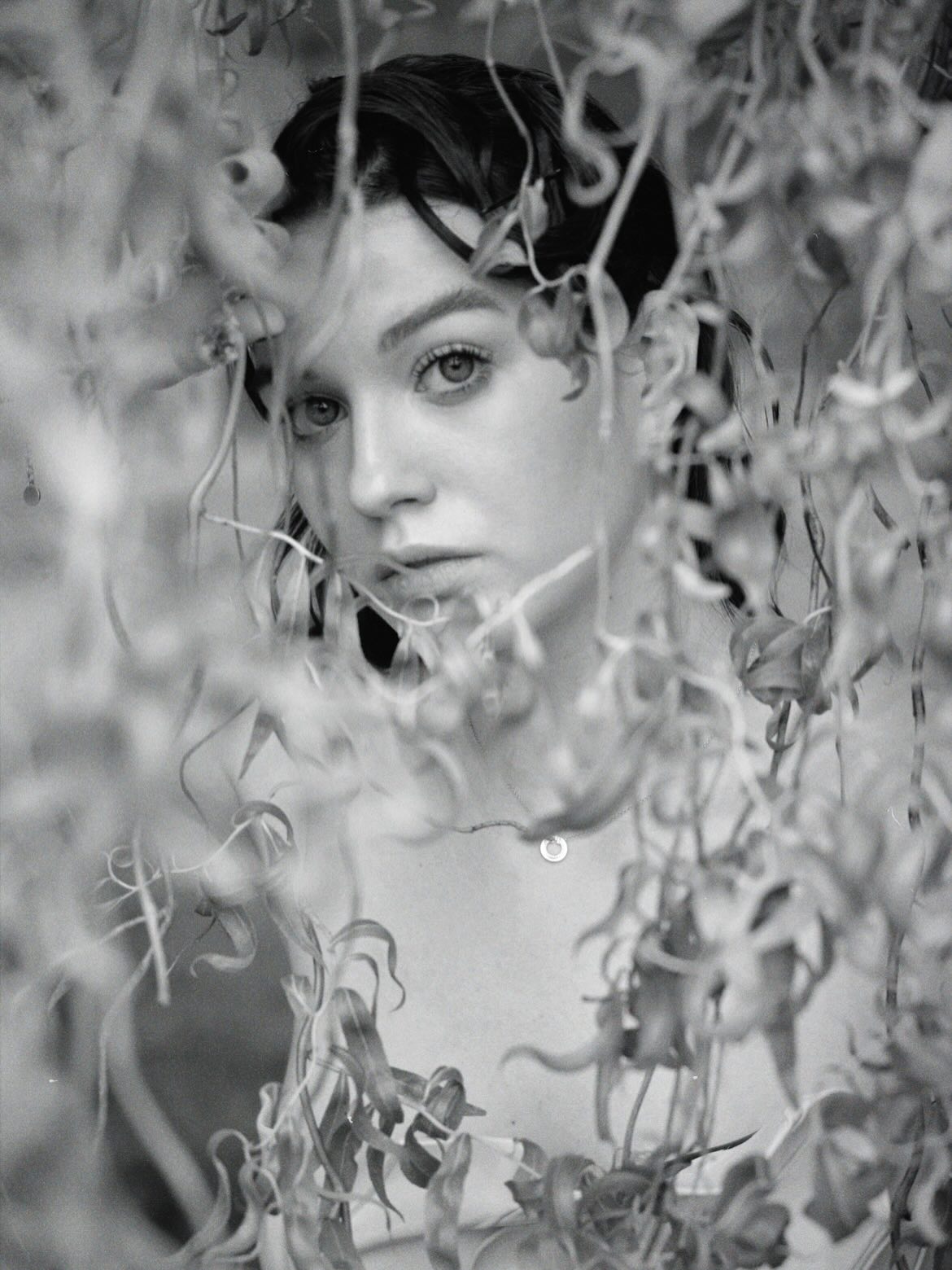 Girl with glasses look up