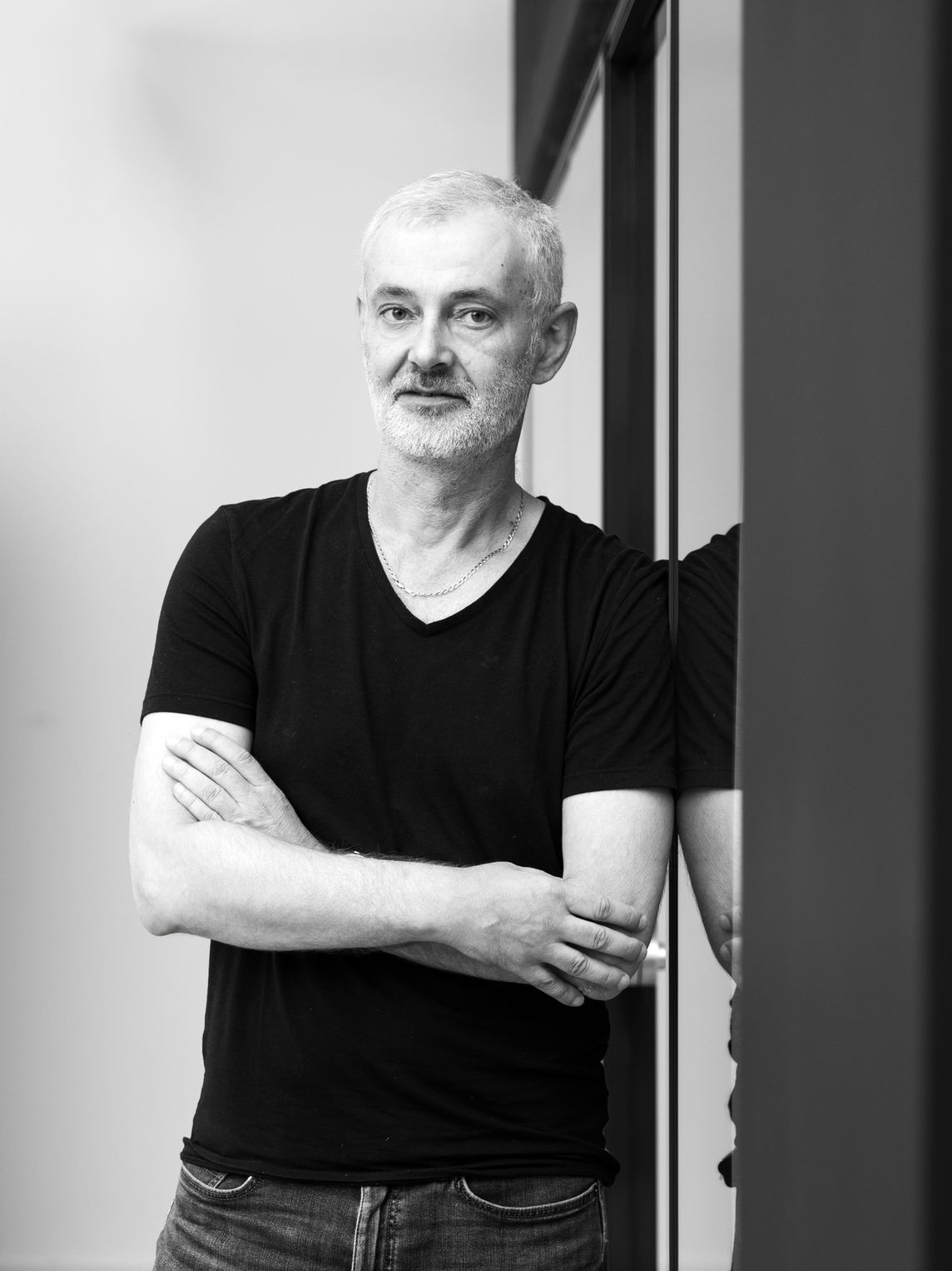 Woman standing between large rock formations