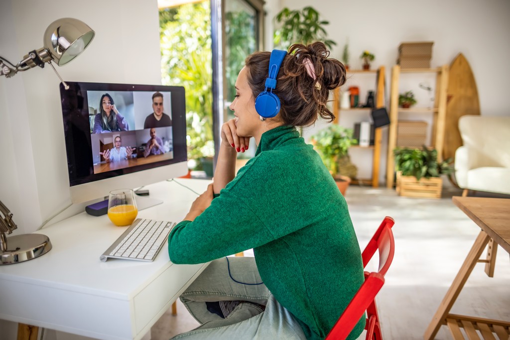 Woman on video call with remote team
