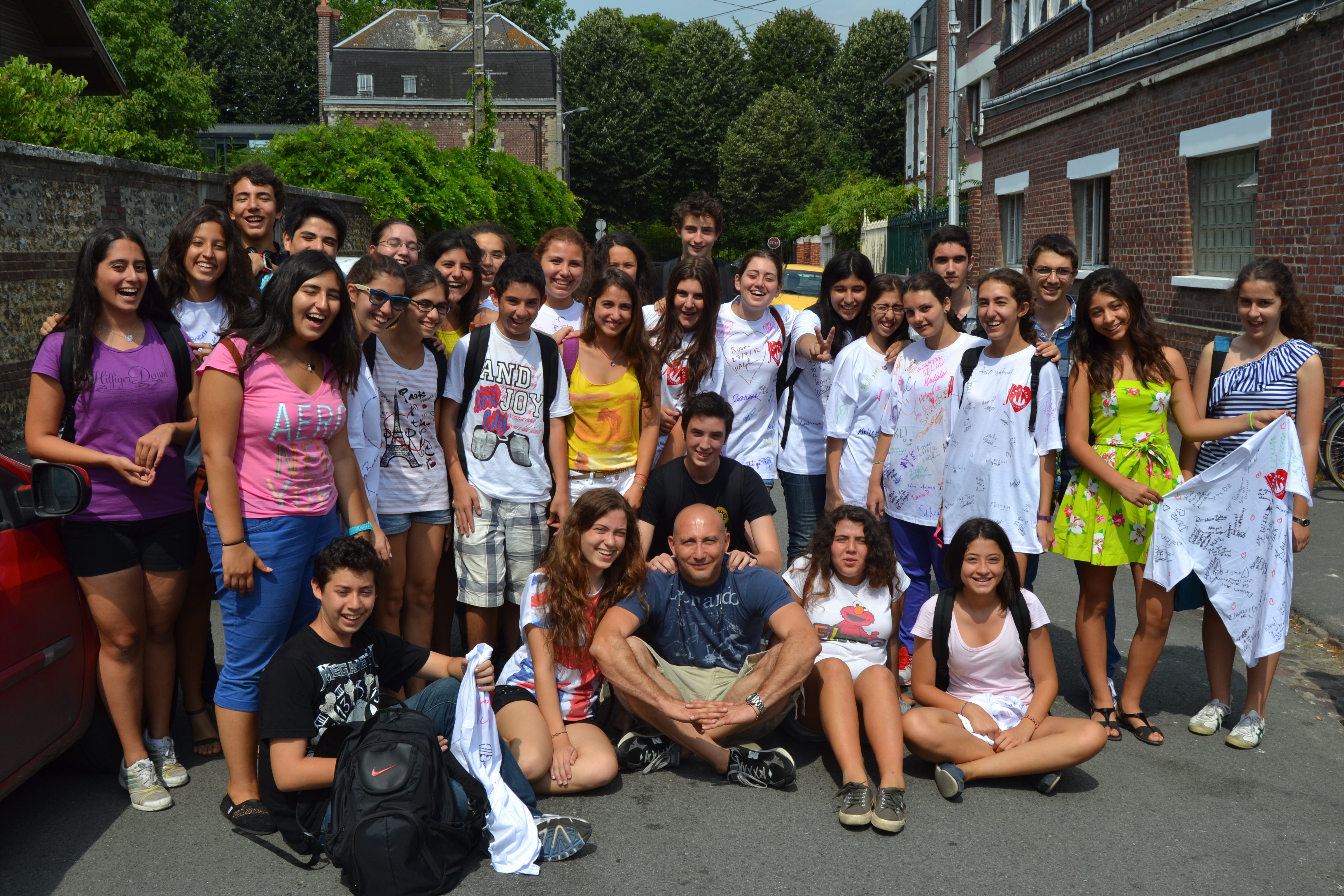 man sitting on couch using MacBook