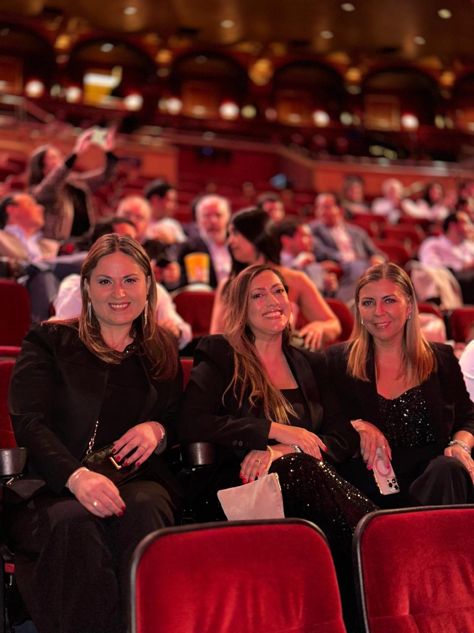 a living room with a couch a table and chairs