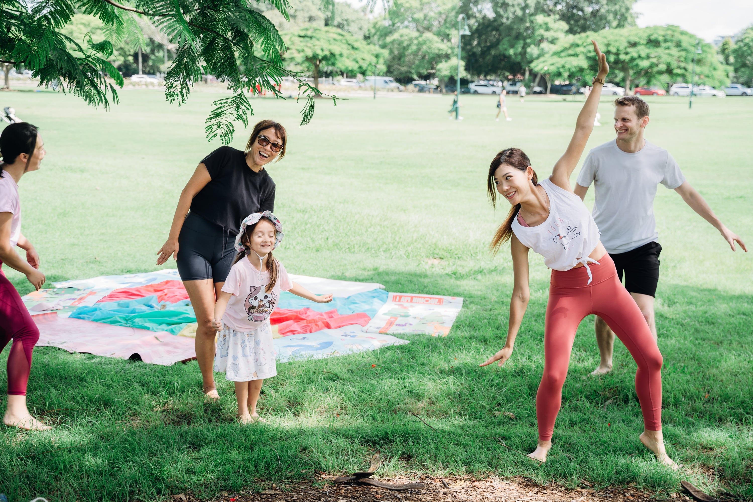 Female yoga instructor teaching a client