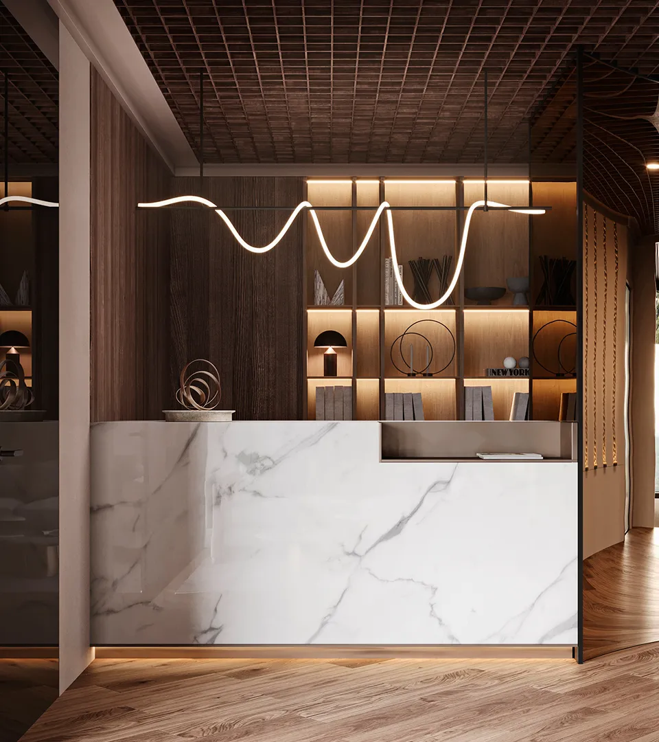 City Studio Zurich office reception desk with marble front, backlit shelving, and sculptural pendant lighting