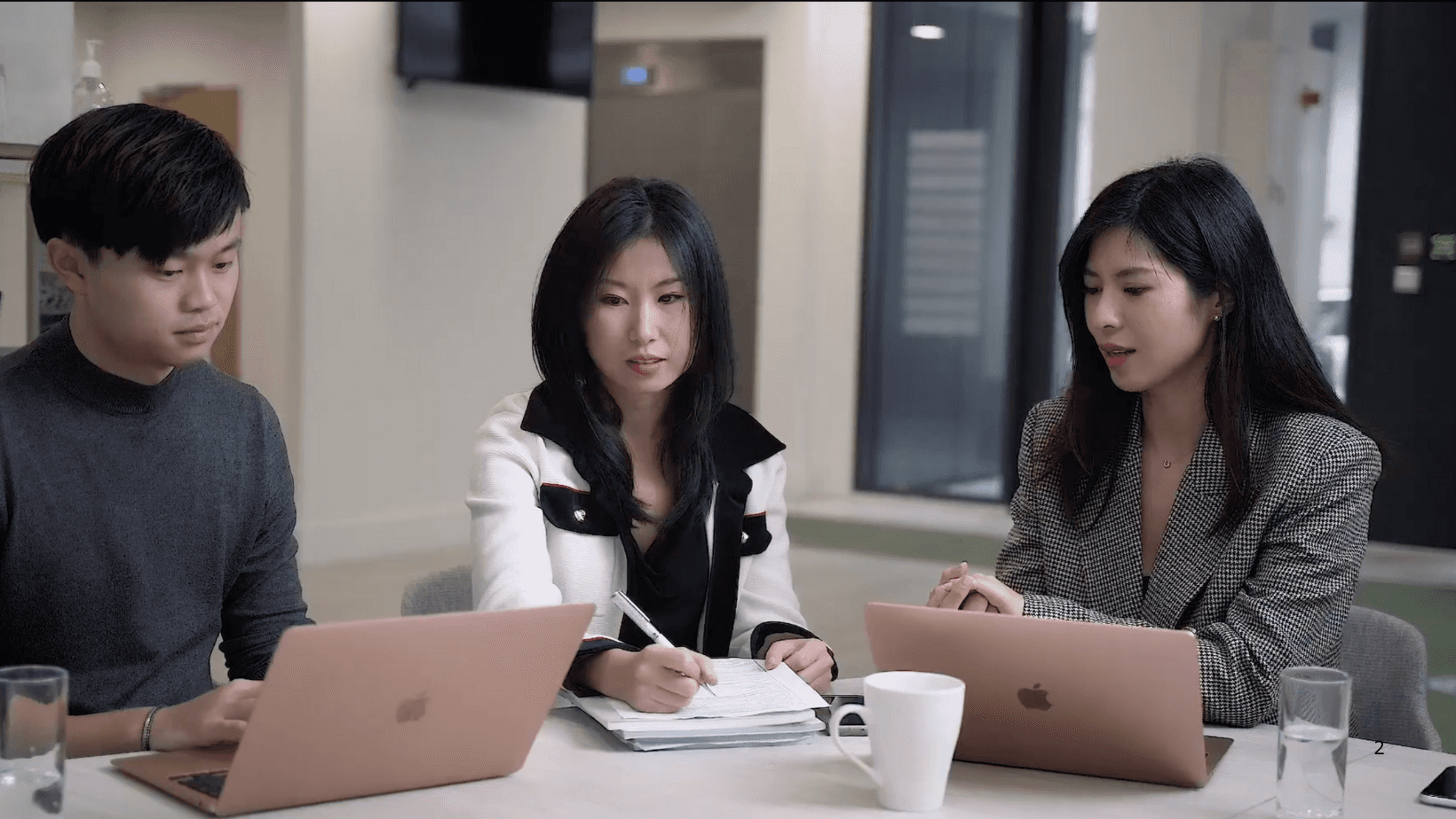Man and woman browsing laptop