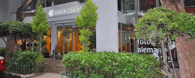 a building with trees and plants