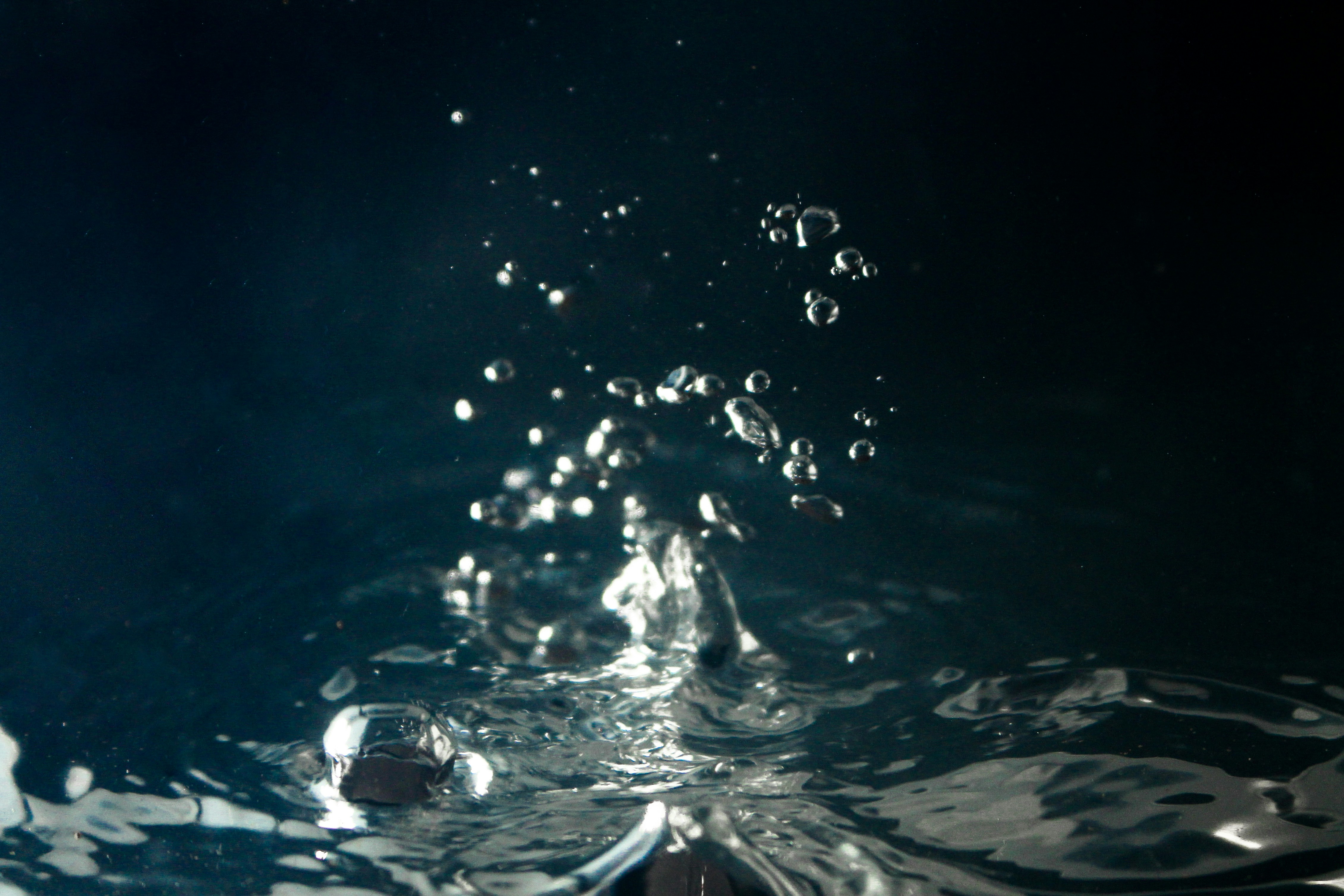 a close up view of water with bubbles