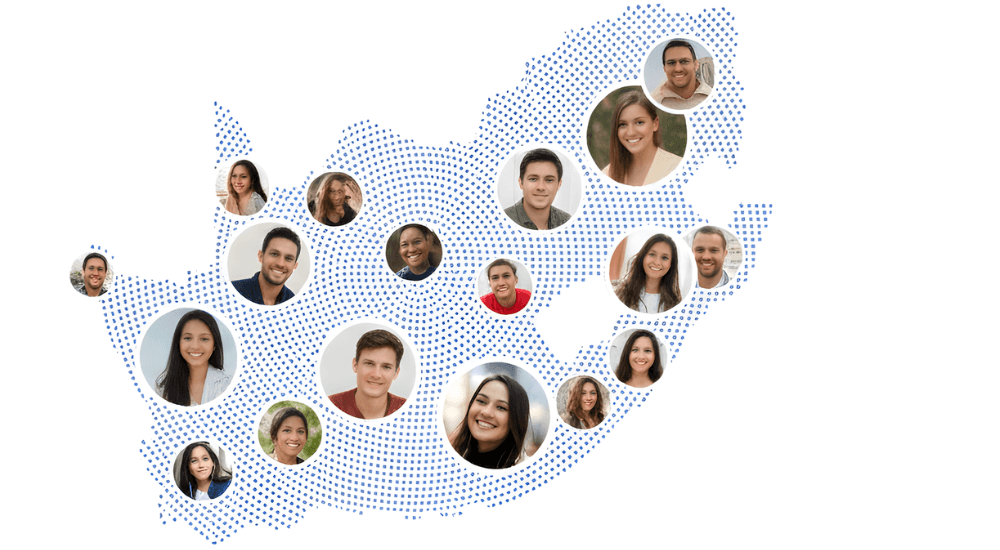 aerial view of city near body of water during daytime