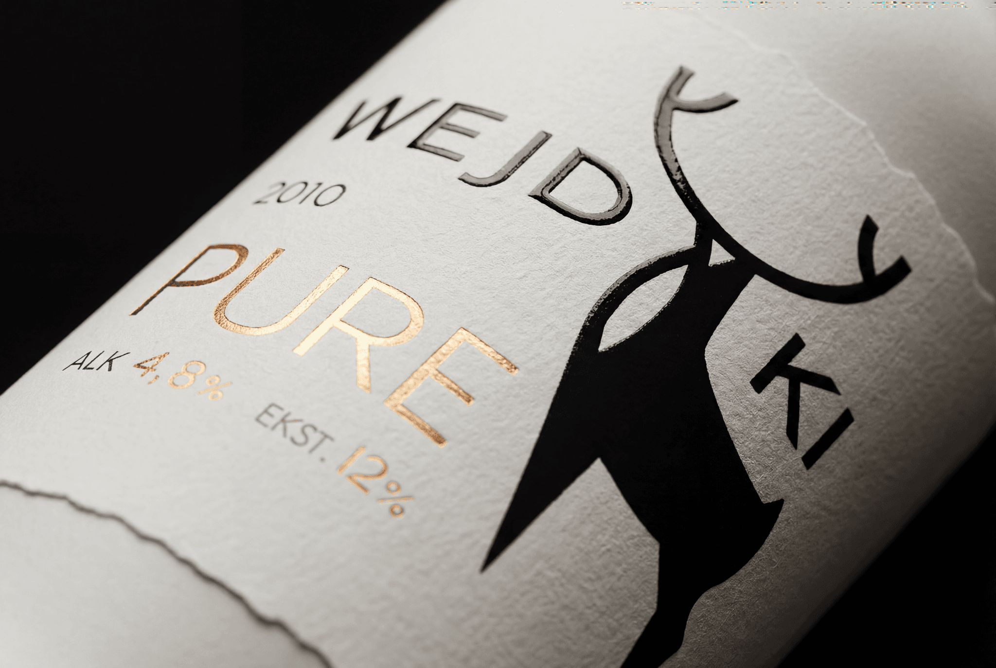 Yellow flowers bloom at the mountain's foot.