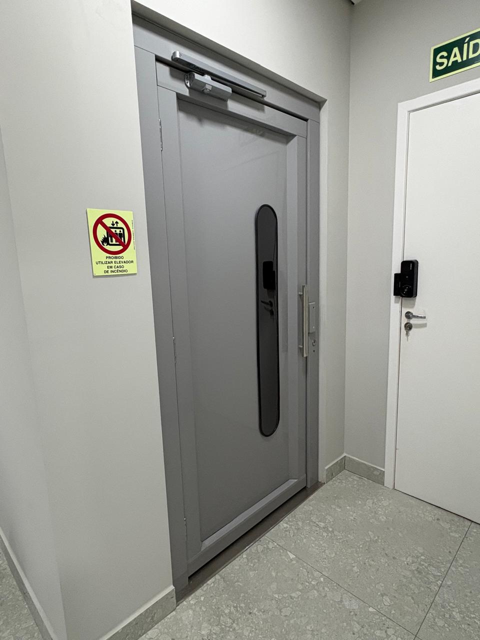 white wooden door with black metal door lever