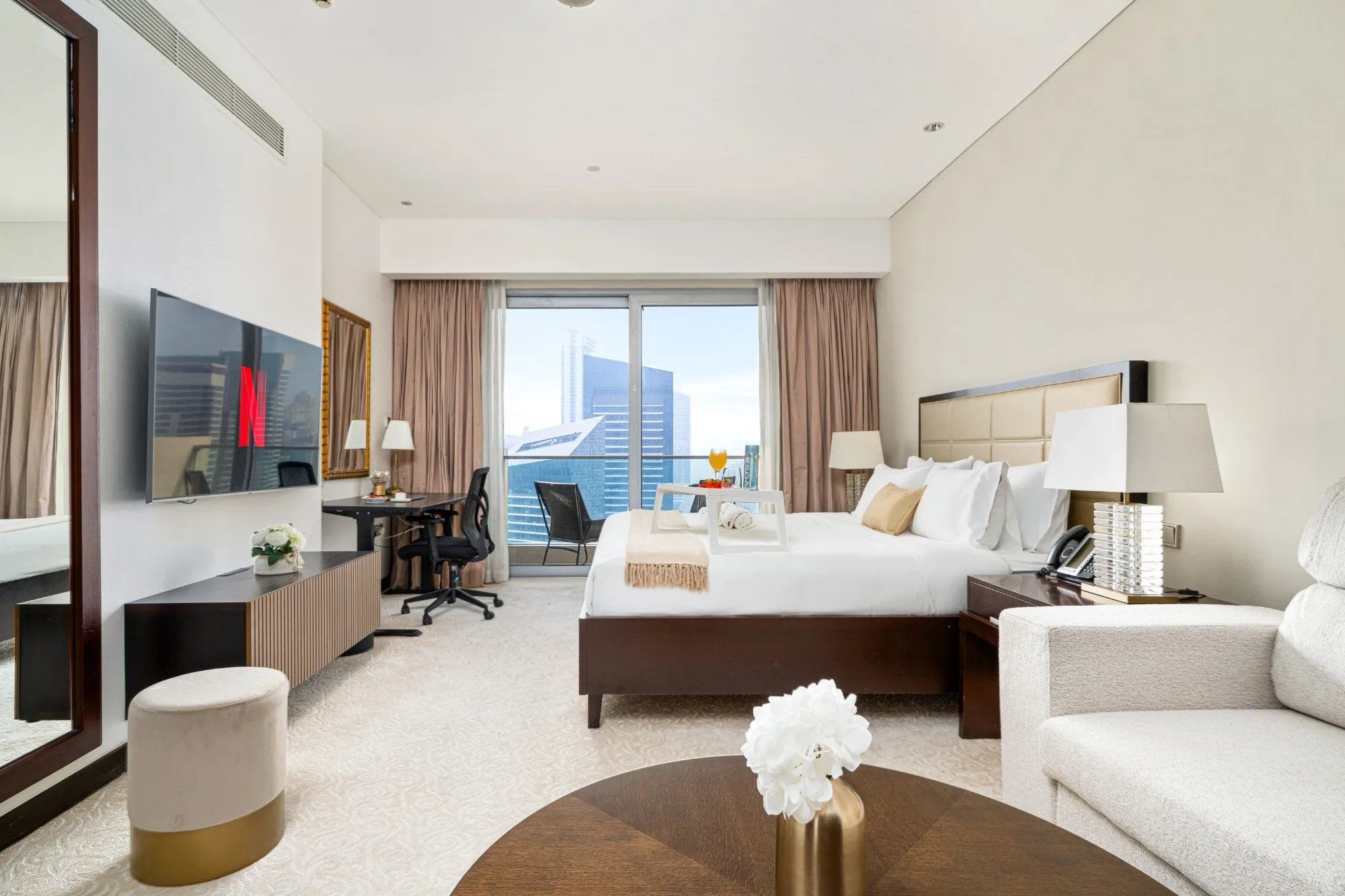 JW Marriott, Dubai Marina — Interior: studio with king bed, desk and balcony