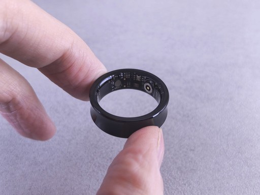 Person holding a smart ring