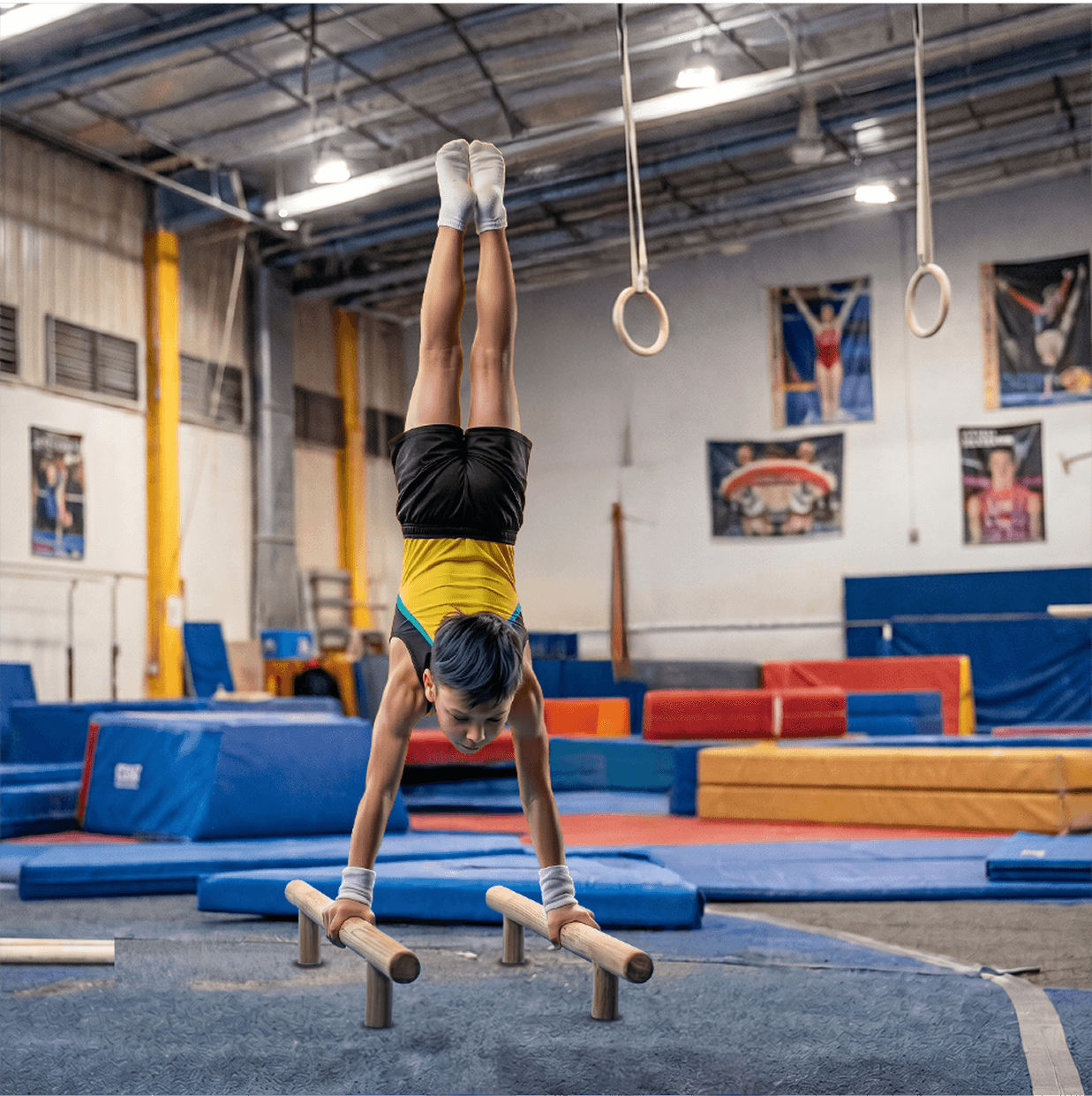 Gymnast performs a routine on the parallel bars.