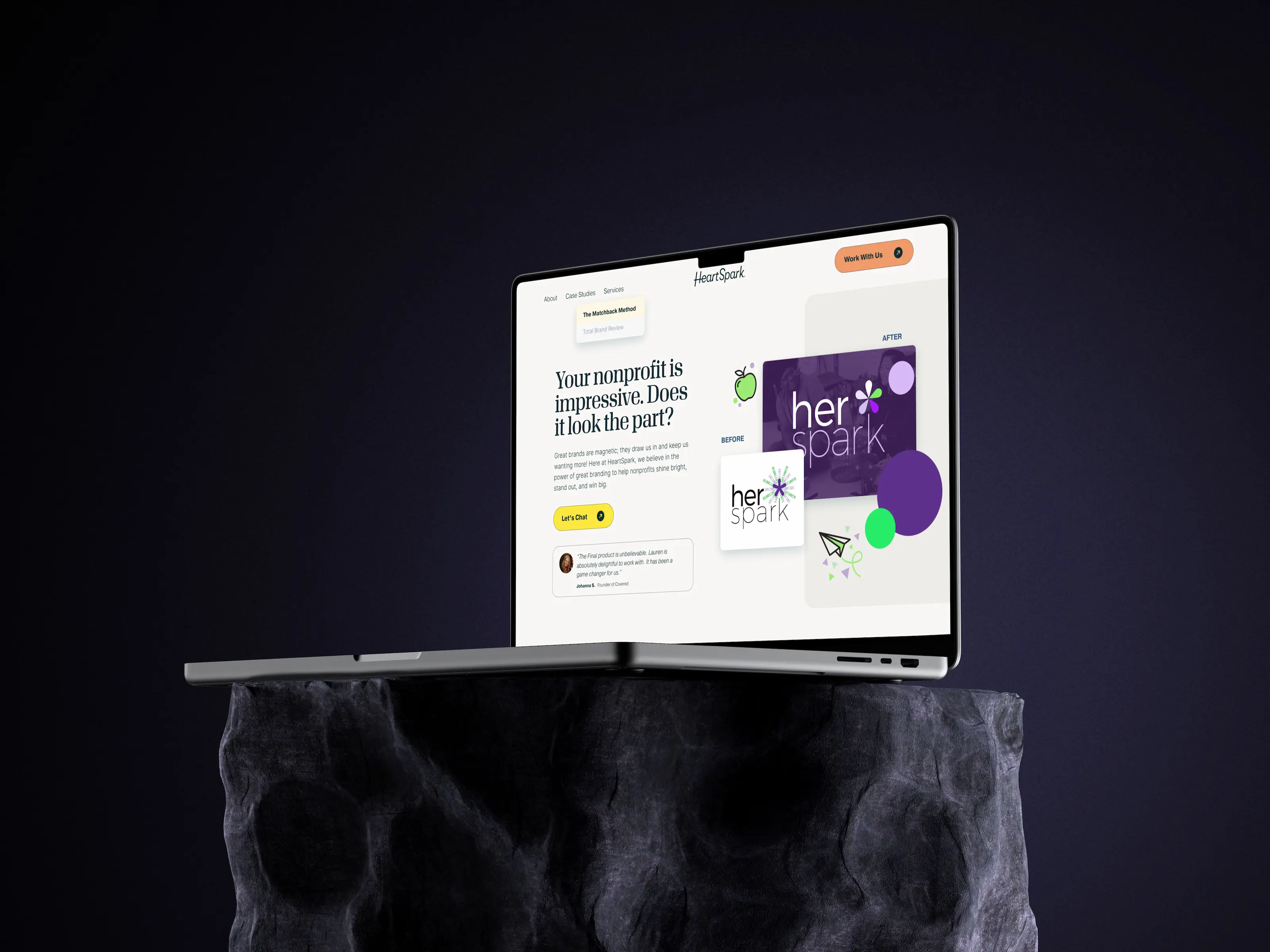 A laptop with a colorful screen displaying digital marketing graphics on a dark background.