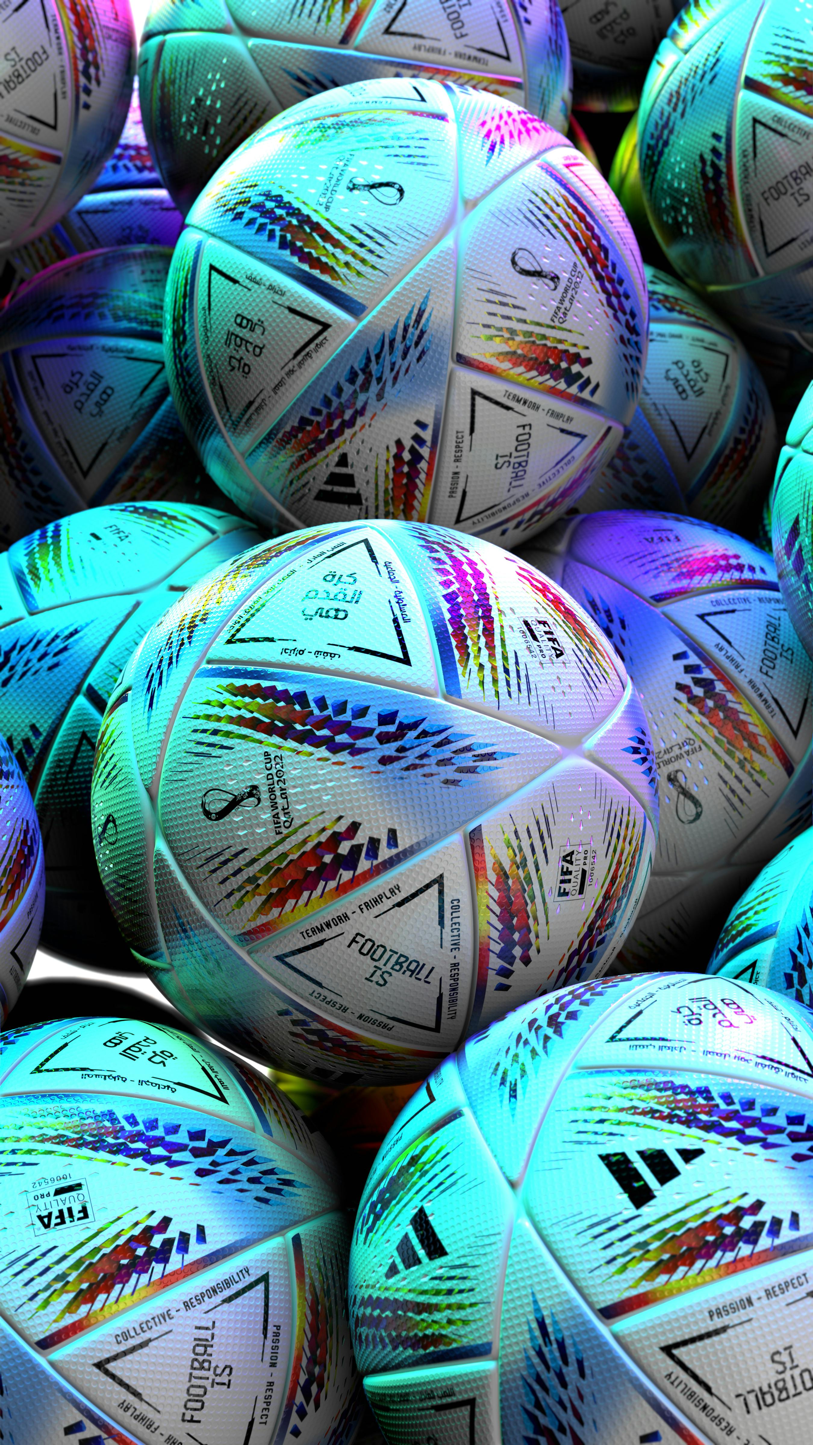 A closeup of a bunch of FiFA soccer balls together.