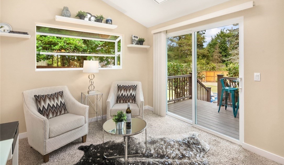 Sitting area with a sliding door to the deck