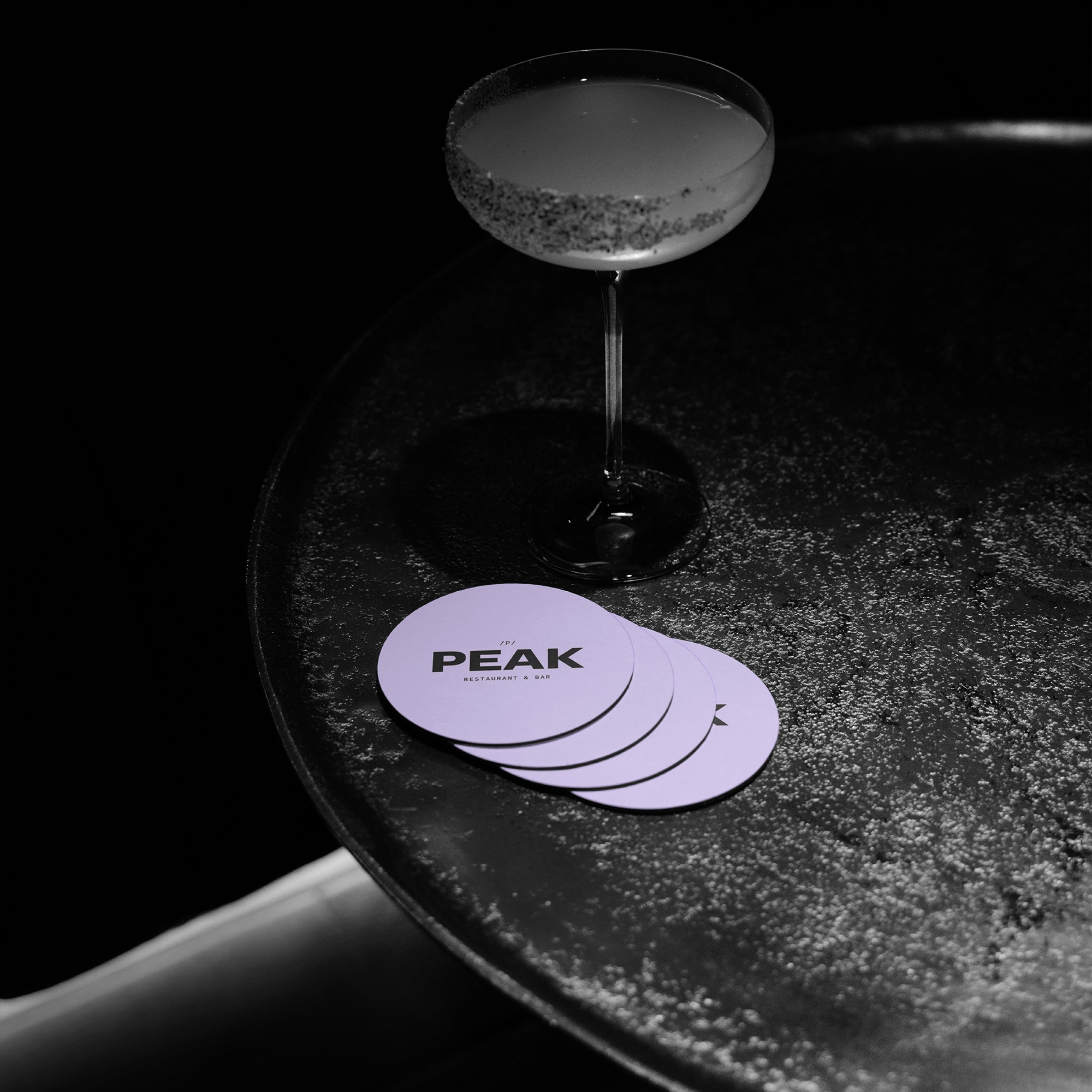 Streetside billboard with flyposters of the Batch.Works brand and illustrations