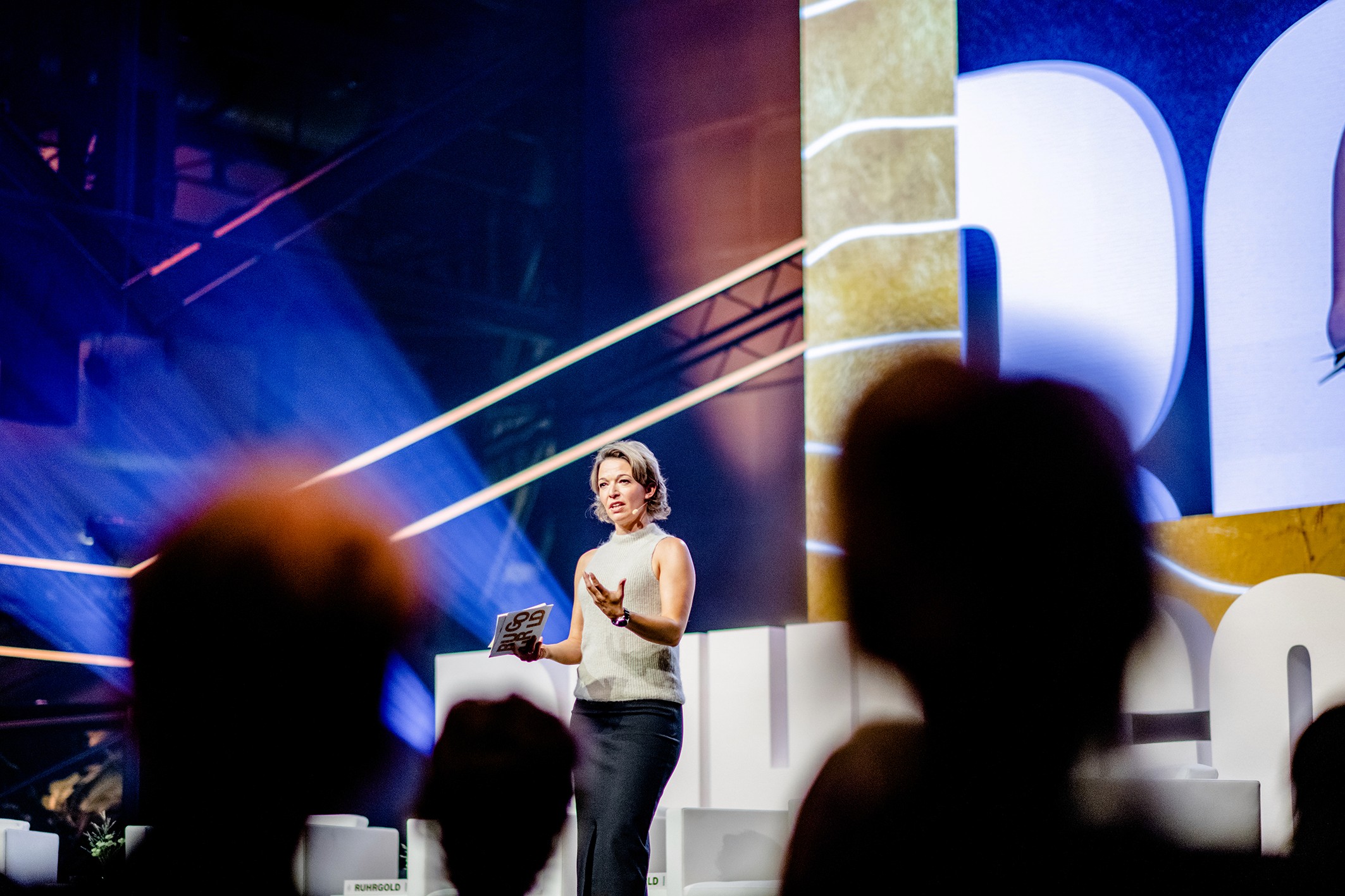 Young girl with a hat smiling in the sunny weather