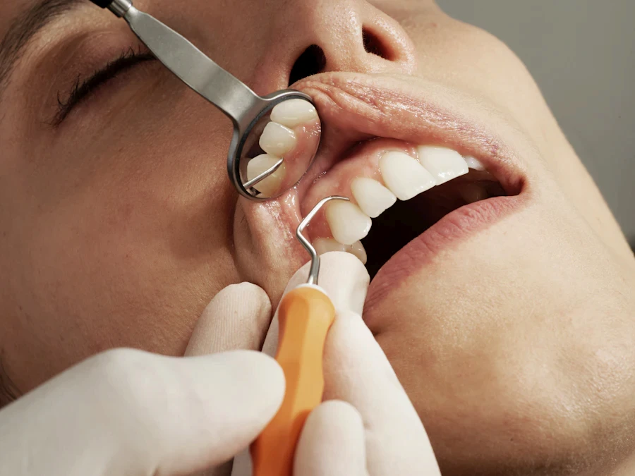 Hygienist cleaning a patient's teeth