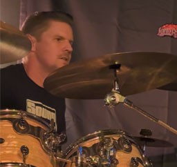 Holland Barry looking serious on drums.