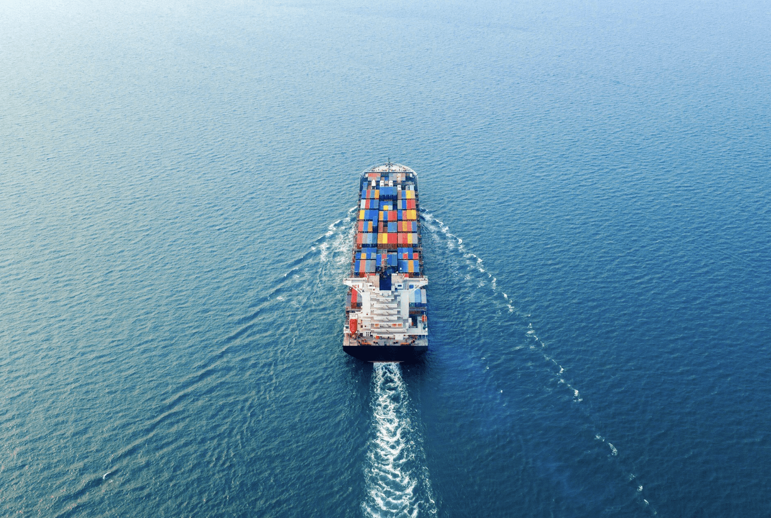 container cargo ship transporting goods at sea