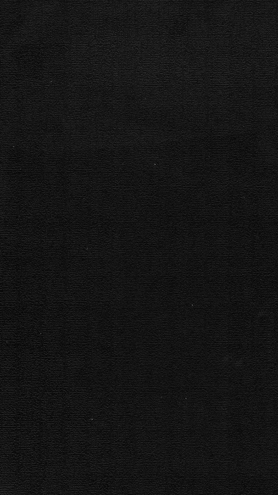 a black book with white stitching on the cover