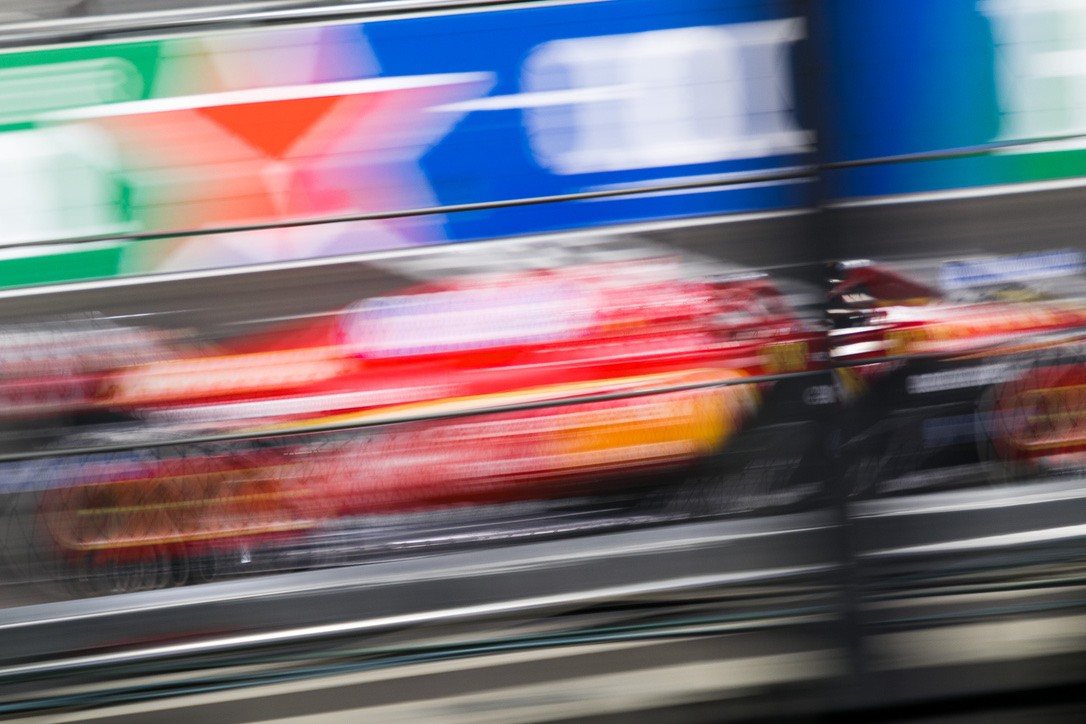 speaker with a half white half green background