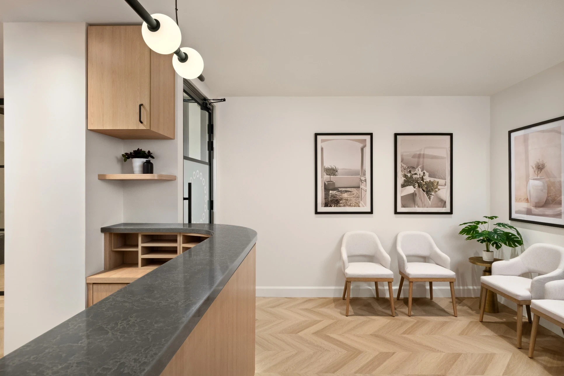 Reception and waiting area for patients at Bloor-Yorkville Periodontics in Toronto, Ontario