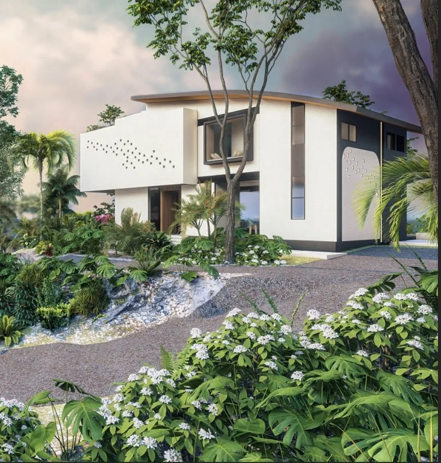 A stylish split-level loft room with an elevated queen bed, modern writing desk below, and floor-to-ceiling windows framing a glowing sunset.