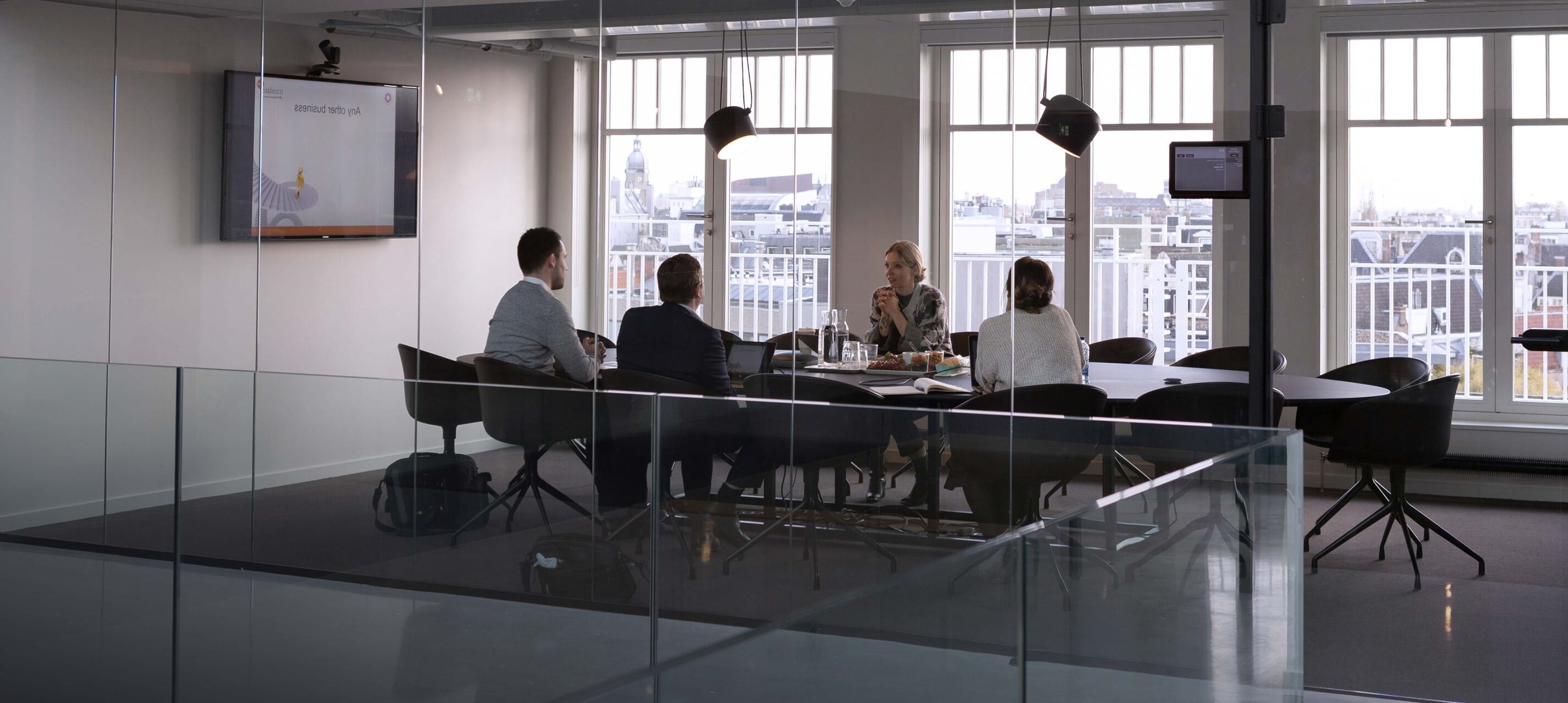 Designers collaborate in a fashion studio.