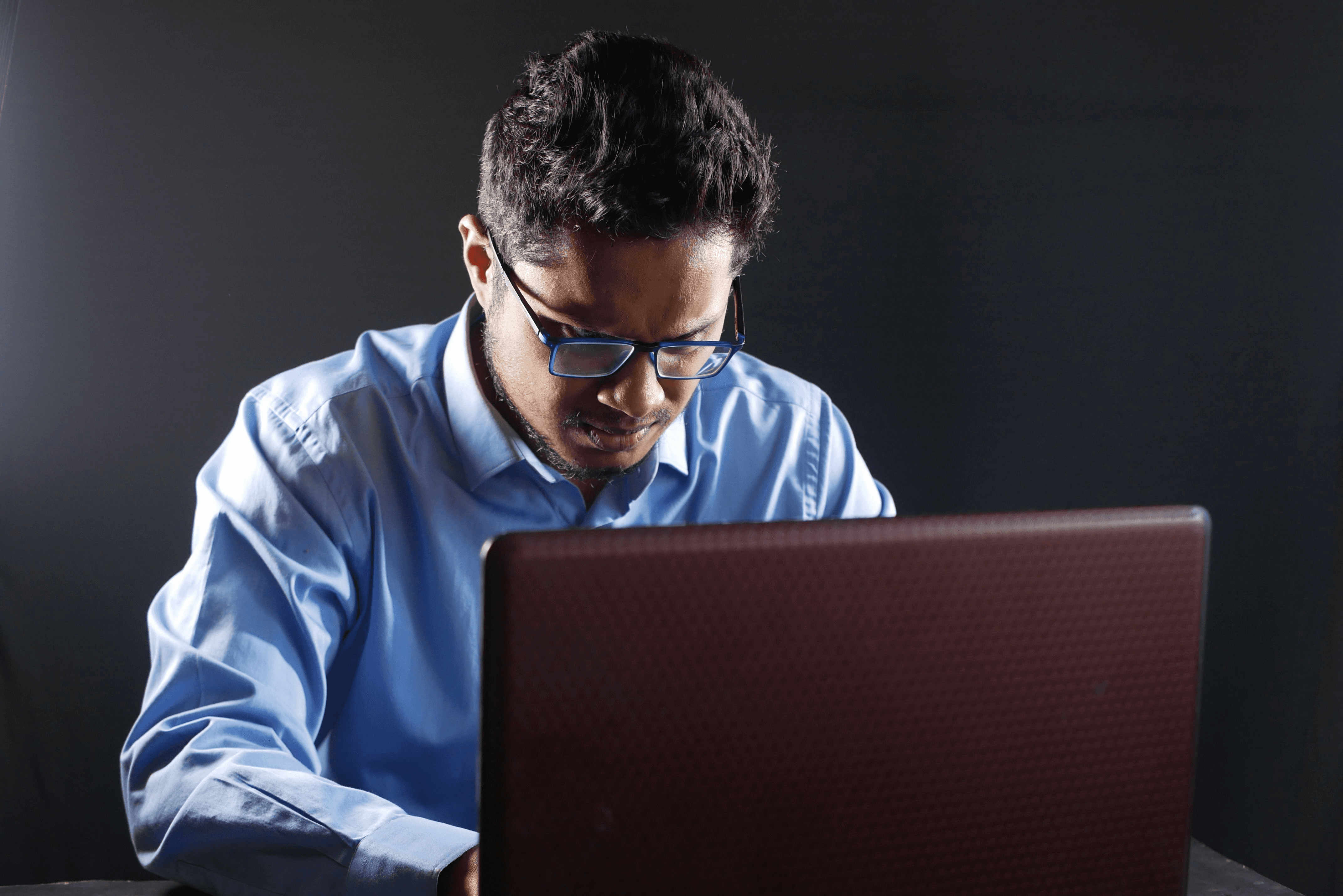 man wearing a blue shirt - Effective Methods for Categorizing Spend Data
