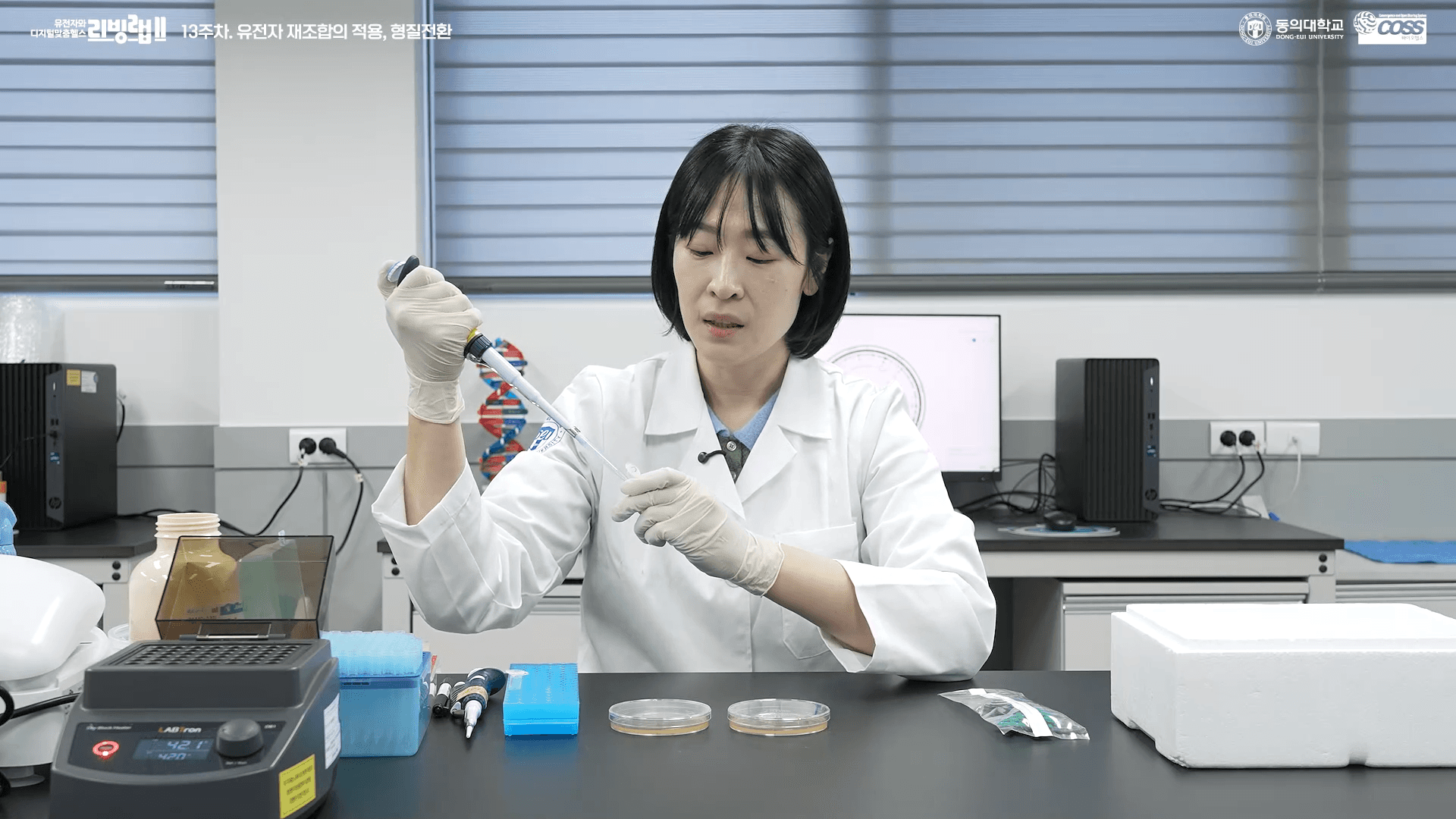 two people looking at a tablet and smiling