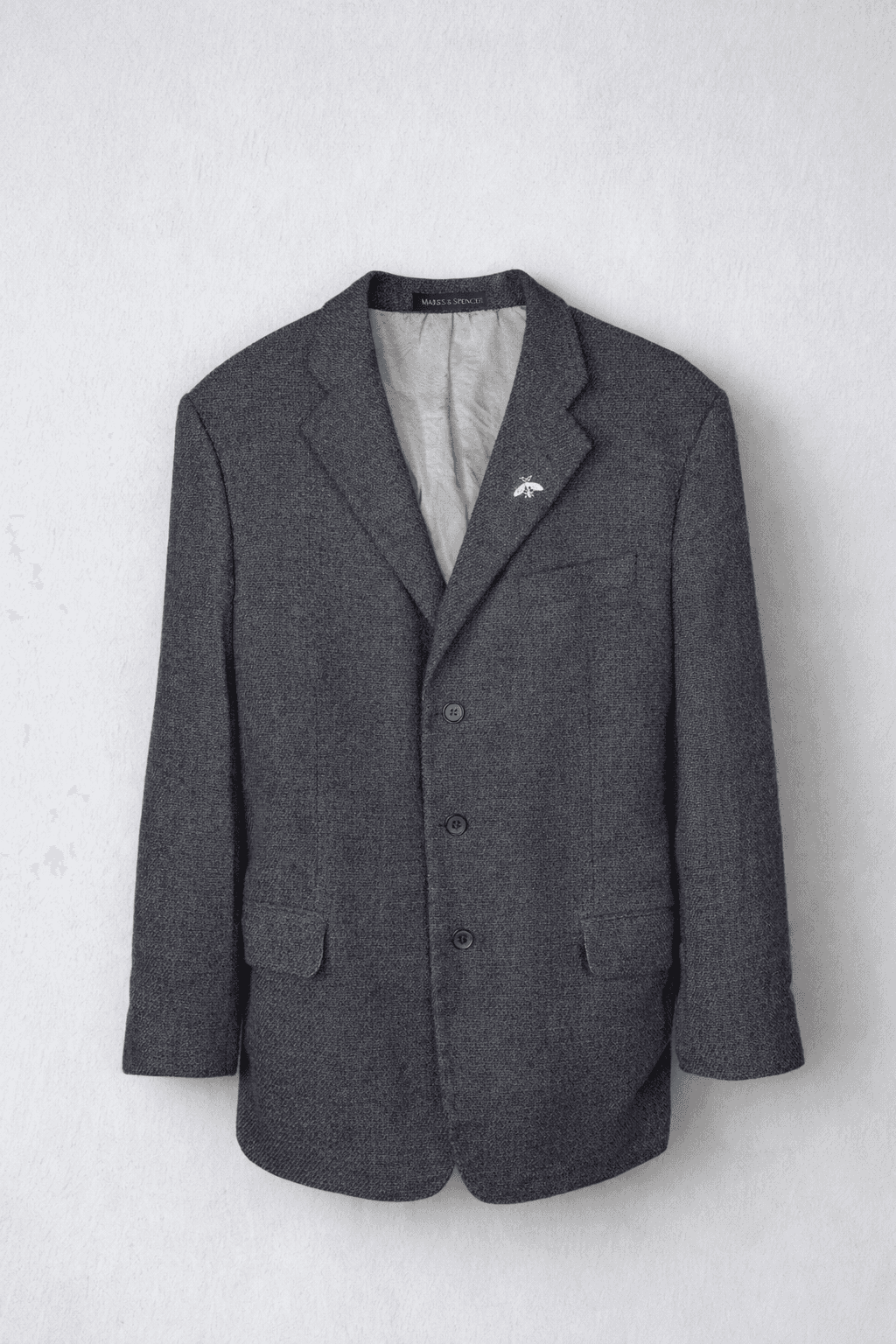 Men's grey blazer with a pocket and buttons