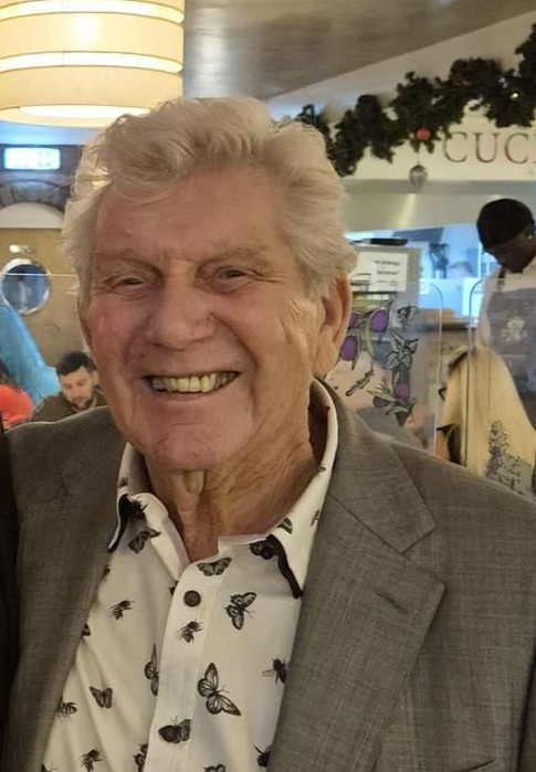 man posing in professional outfit