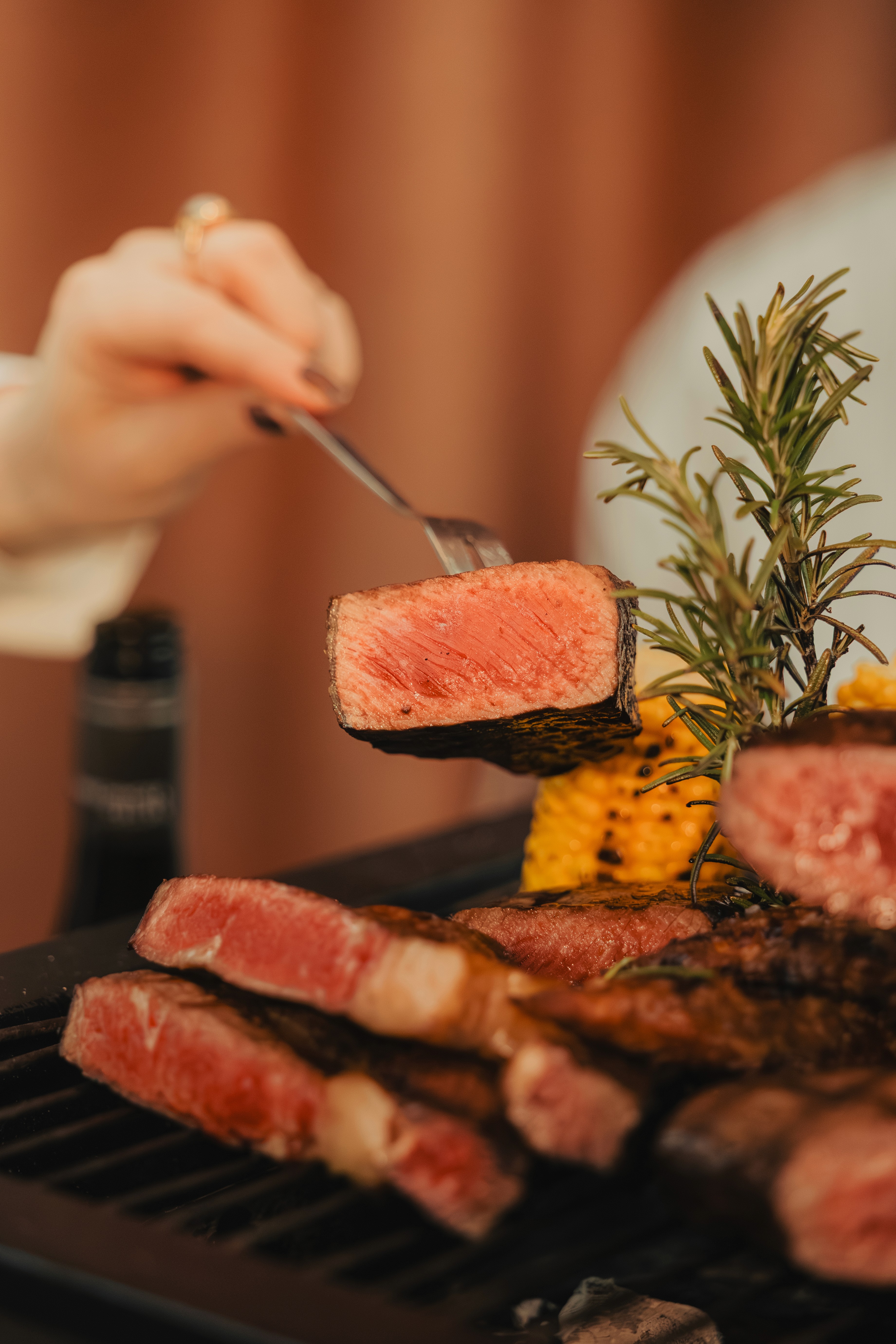 raw meat on stainless steel tray
