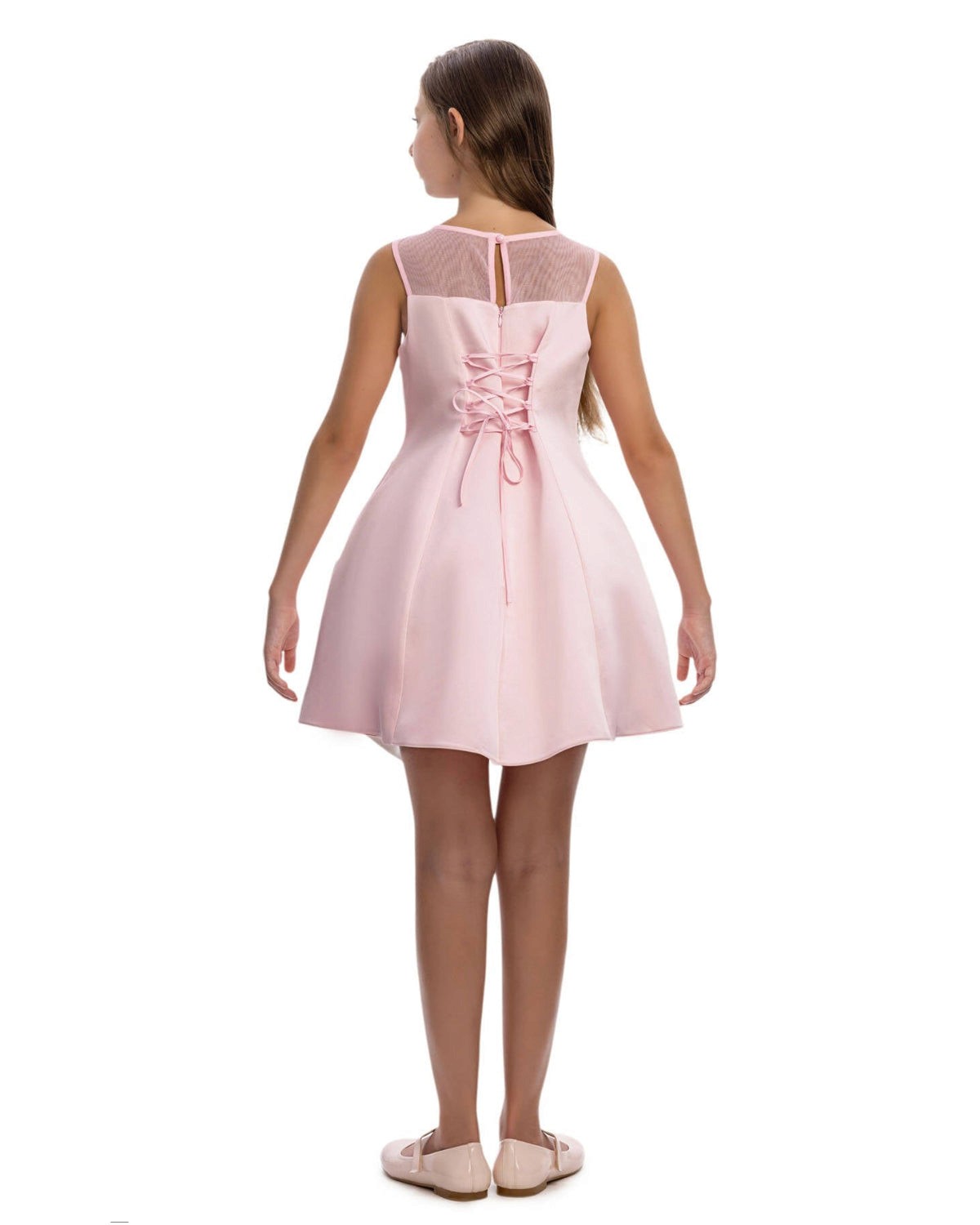 Pink dress with lace-up back on a white background