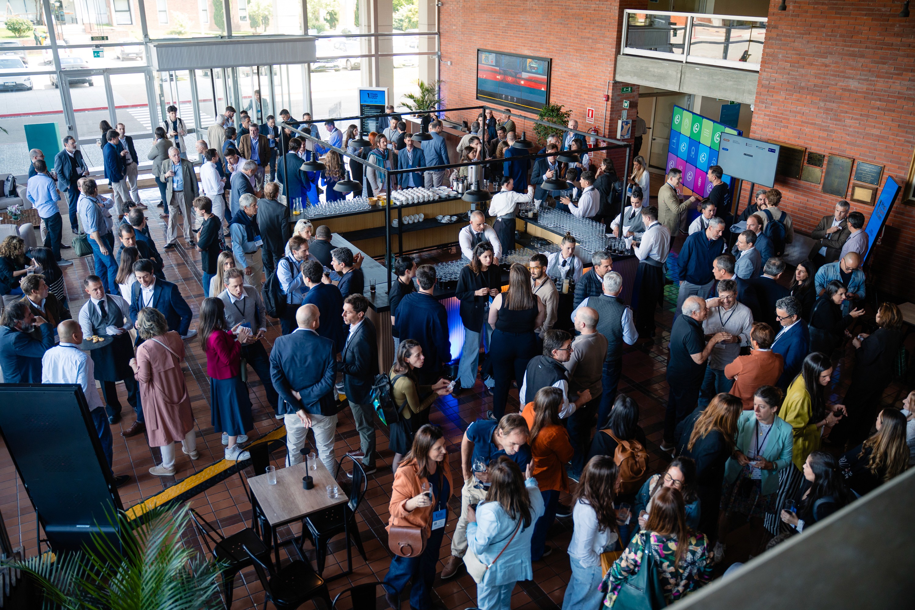 man wearing gray polo shirt beside dry-erase board