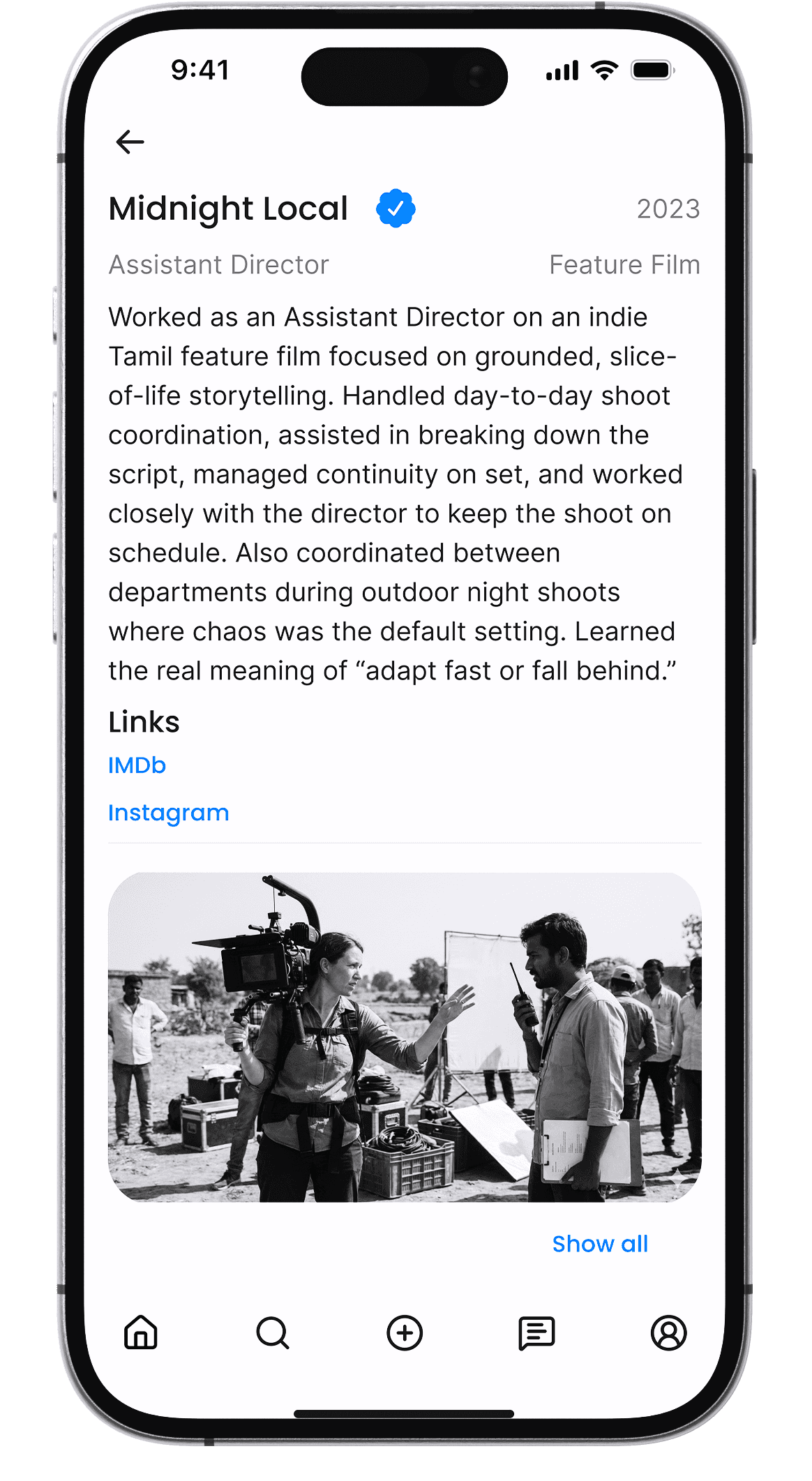 Film producer reviewing verified crew portfolios on a hiring platform
