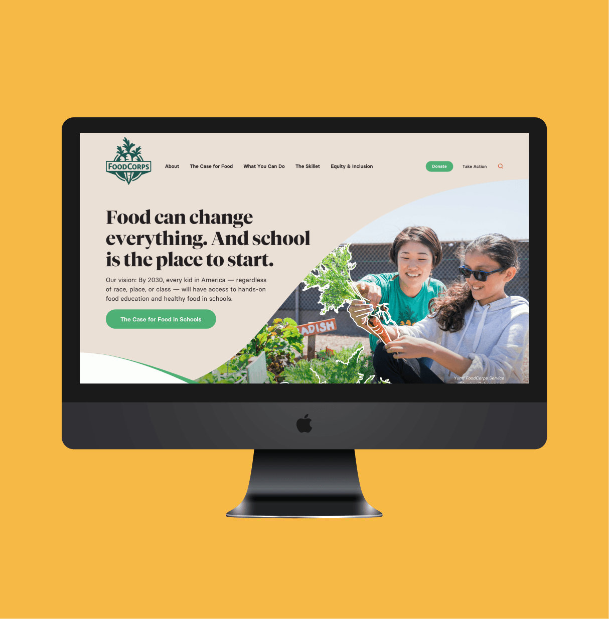 Desktop monitor mockup of the FoodCorps redesigned homepage