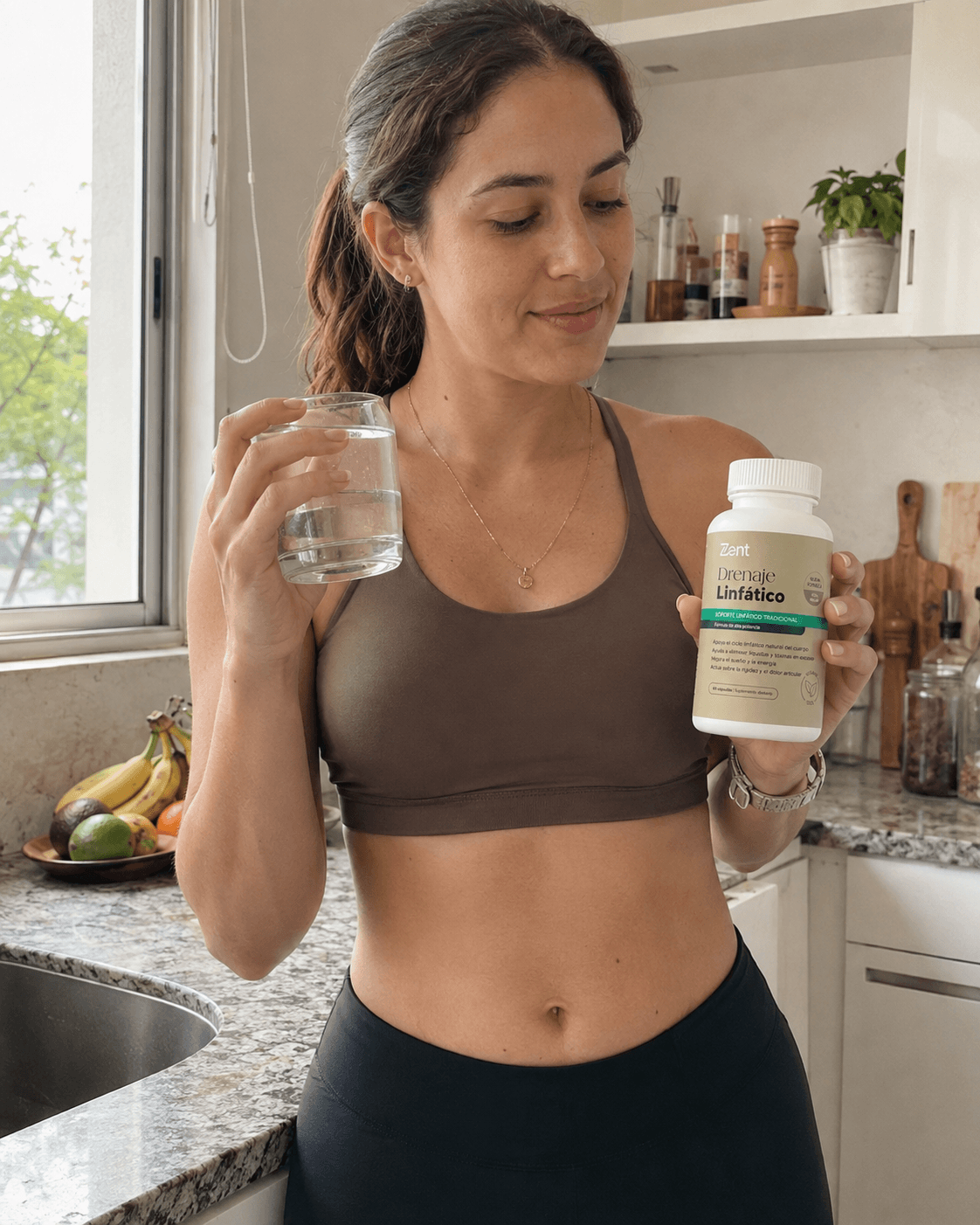 woman drinking coffee while having hands placed on the supplement box