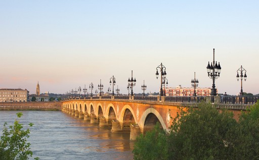 a bridge over a river in Bordeaux