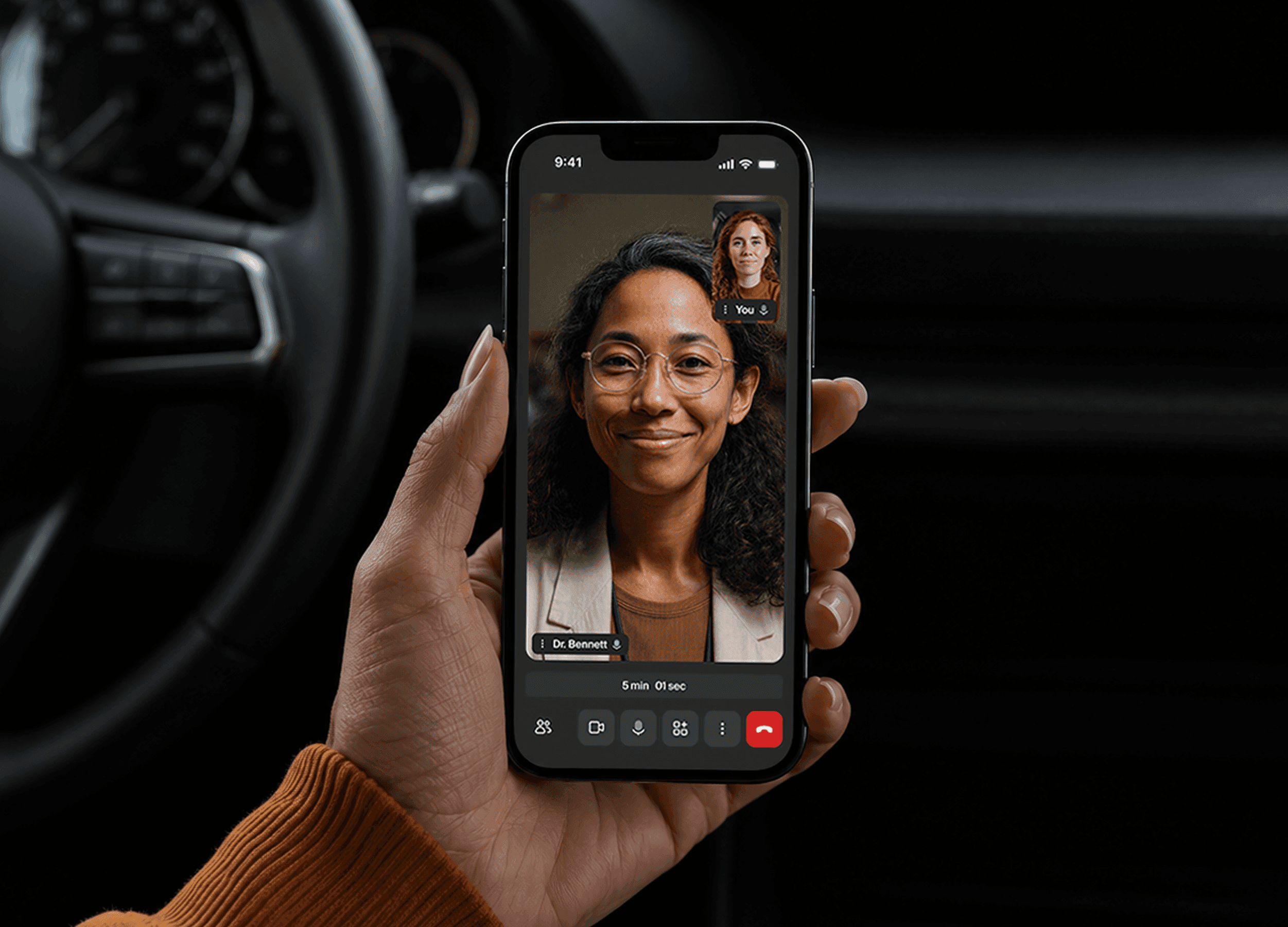 the doxy.me call UI on a smartphone during a call in a car.