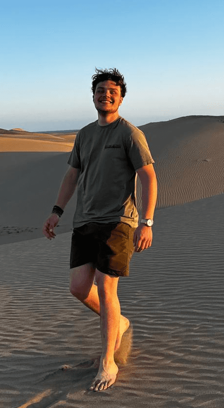 man wearing black crew-neck shirt