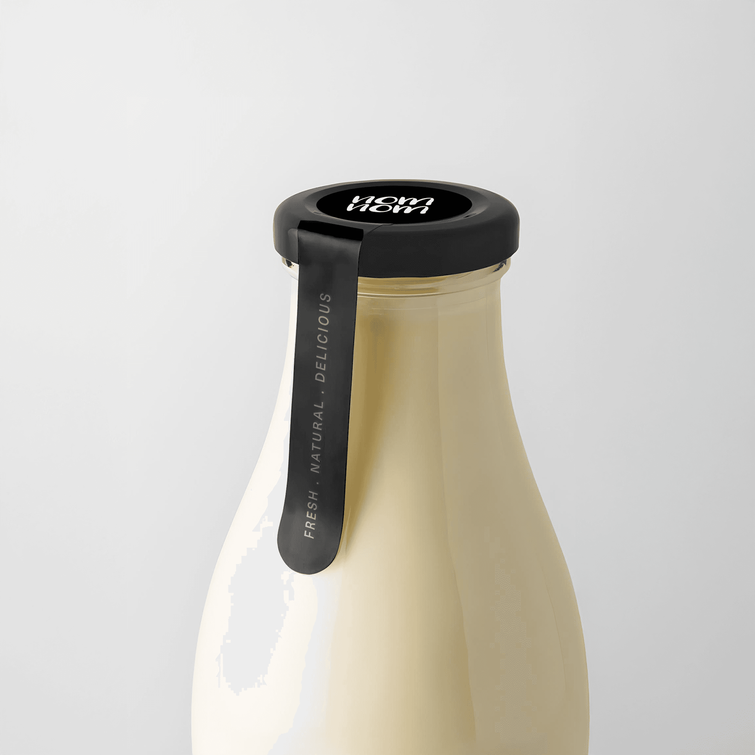 Glass bottle neck with minimalist black seal and handwritten batch code