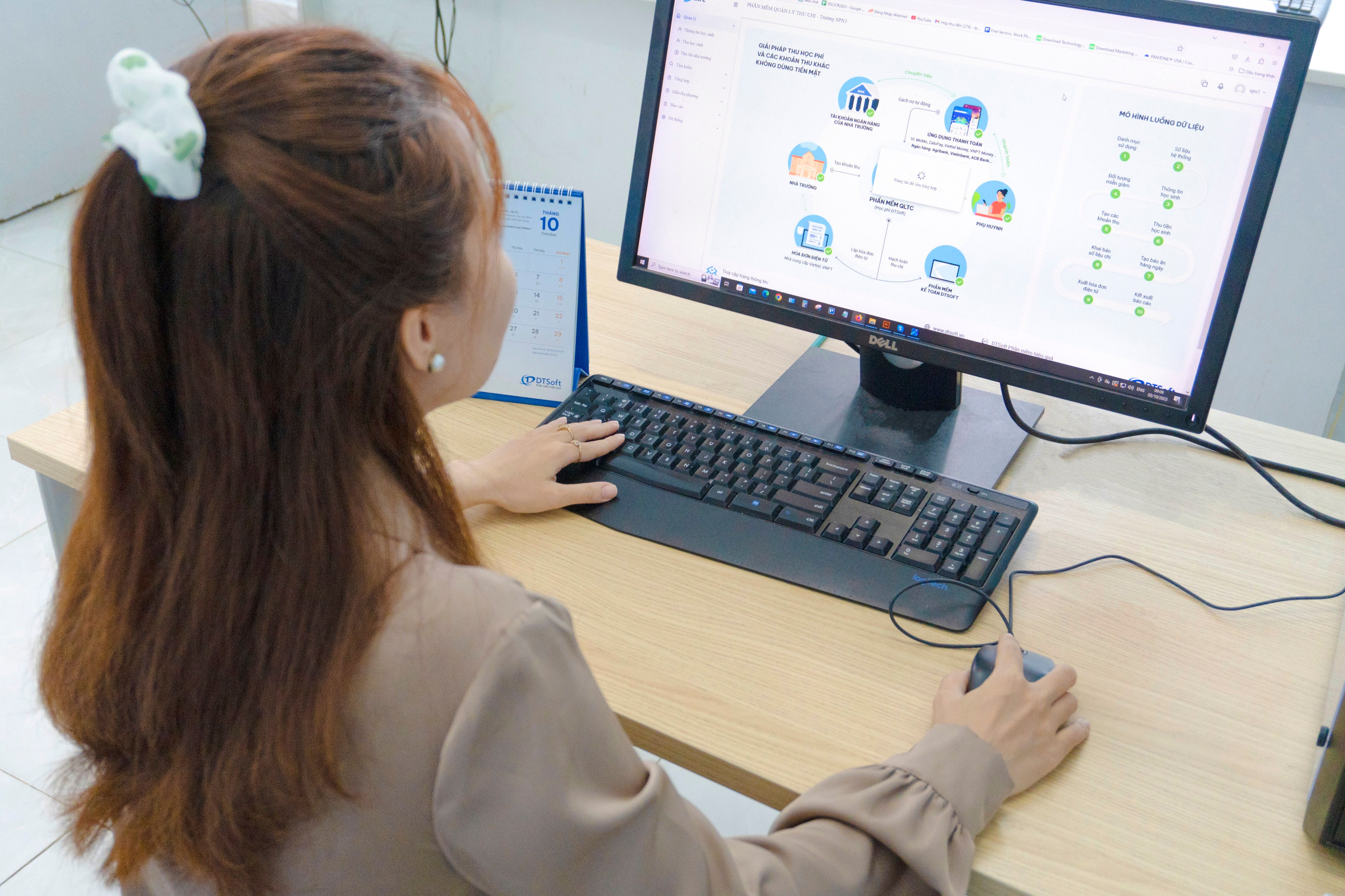 Employee reviewing business applications 