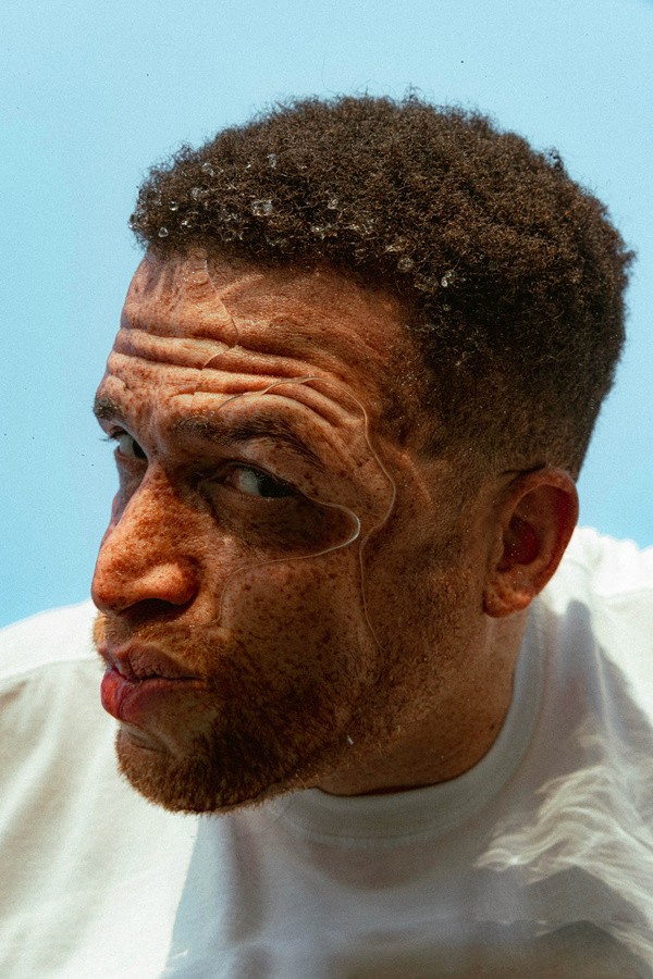 side-view of ripple image of mans face underwater